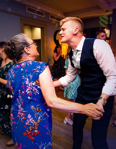 Young-man-dancing-with-his-grandma