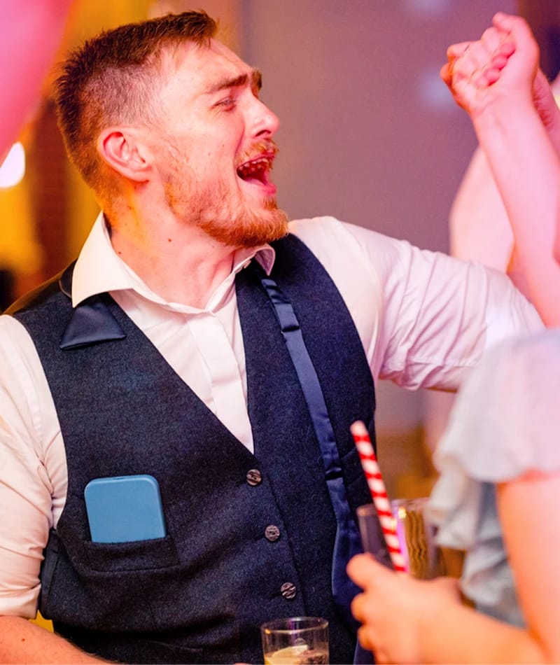 Gallery-1 Two men dancing and singing at a wedding